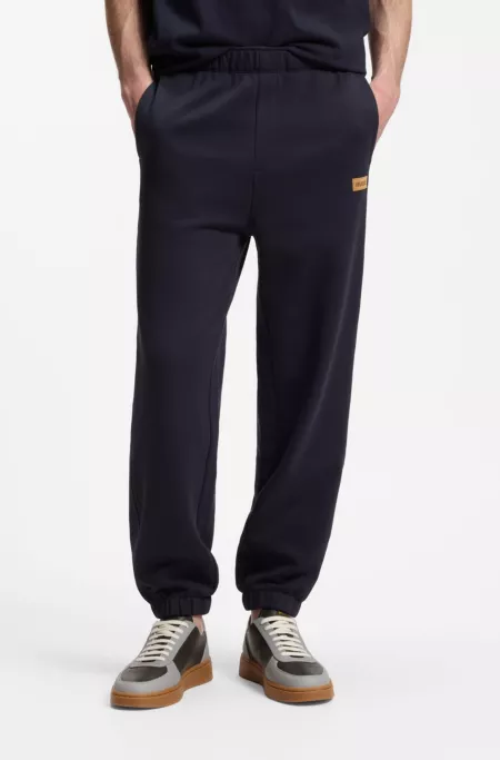Cotton-terry tracksuit bottoms with logo badge