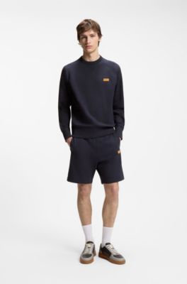 Regular-fit shorts in cotton with suede logo badge, Dark Blue