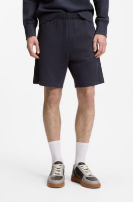 Regular-fit shorts in cotton with suede logo badge, Dark Blue