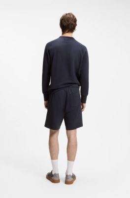 Regular-fit shorts in cotton with suede logo badge, Dark Blue