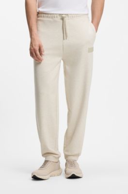 Pantaloni relaxed fit in innovativo french terry, Colore neutro