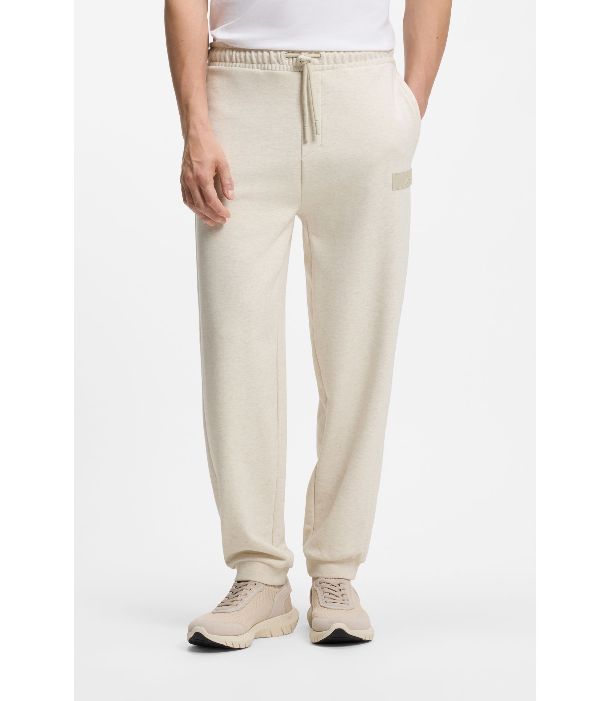 BOSS - Relaxed-fit trousers in innovative French Terry - Natural