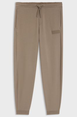Pantaloni relaxed fit in innovativo french terry, Marrone