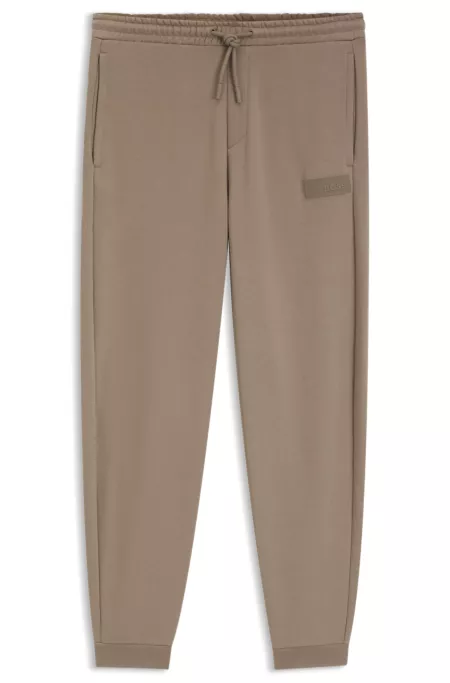 Pantalones relaxed fit en innovadora felpa de rizo