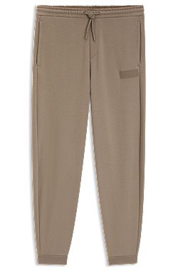 Relaxed-fit trousers in innovative French Terry