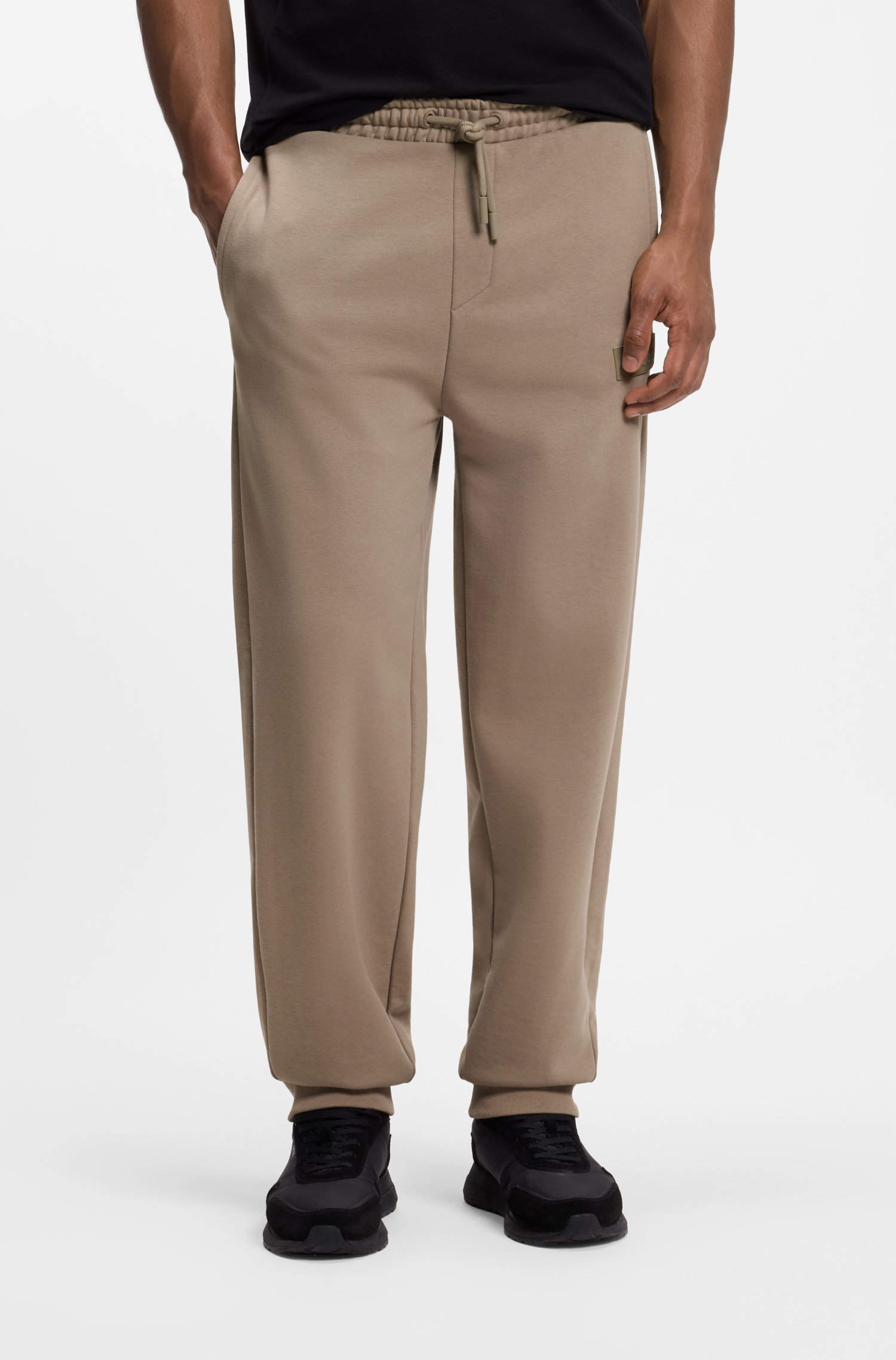 Boss Relaxed-fit trousers in innovative French Terry byxor herr