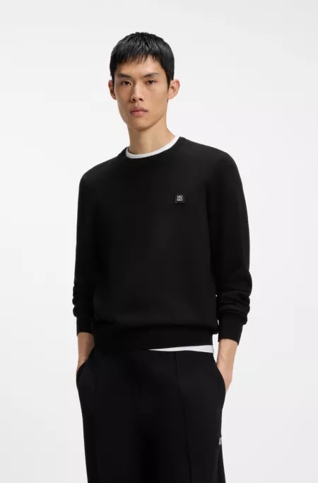 Pull en piqué avec logo revisité métallique