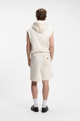 Sweat &agrave; capuche sans manches en molleton de coton avec badge logo, Naturel