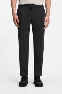 Pantaloni relaxed fit con pieghe sulla parte anteriore, Nero