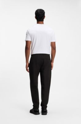 Active tapered-fit trousers in water-repellent stretch fabric, Black