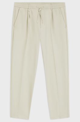 Pantaloni attivi con fit affusolato in tessuto elasticizzato idrorepellente, Beige chiaro