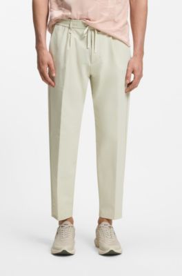 Pantaloni attivi con fit affusolato in tessuto elasticizzato idrorepellente, Beige chiaro