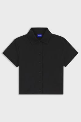 Slim fit-pik&eacute;tr&ouml;ja i bomull med stretch, Svart