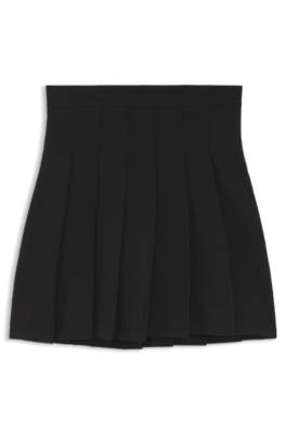 Pleated skirt in stretch cotton with integrated shorts