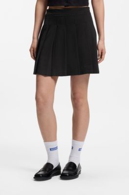 Gonna a pieghe in cotone elasticizzato con shorts integrati, Nero