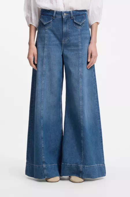 Wide-leg high-rise jeans in vintage-wash denim