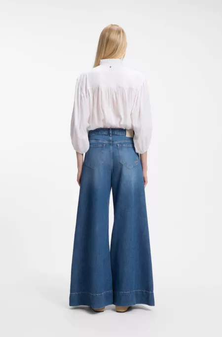 Wide-leg high-rise jeans in vintage-wash denim