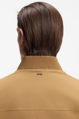 Water-repellent jacket with monogram-pattern sleeves, Beige