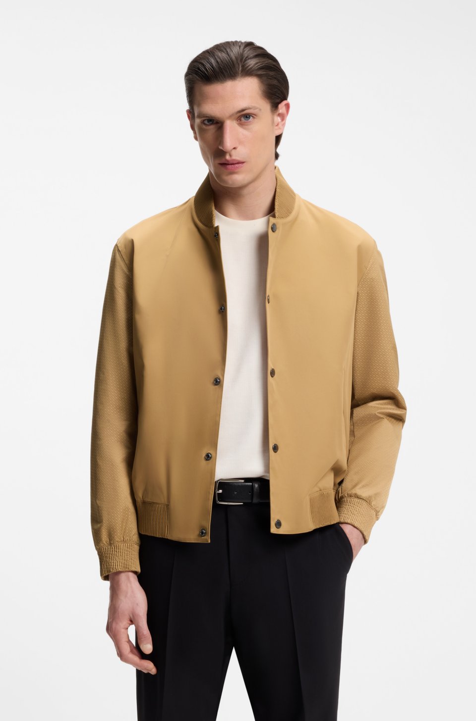 Water-repellent jacket with monogram-pattern sleeves
