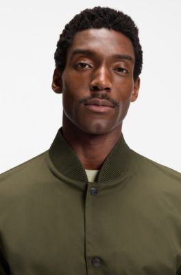 Water-repellent jacket with monogram-pattern sleeves, Dark Green