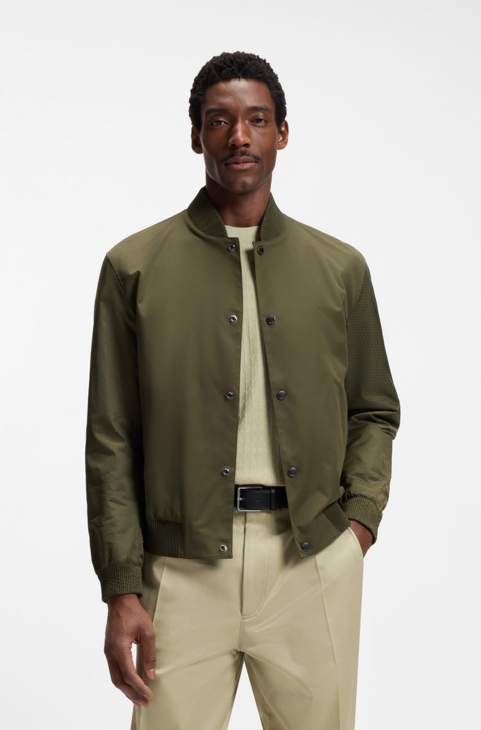 Water-repellent jacket with monogram-pattern sleeves