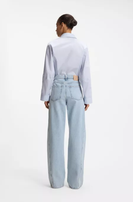 High-rise wide-leg jeans in marble peachy denim