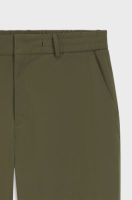 Tapered-fit trousers in performance stretch fabric, Green