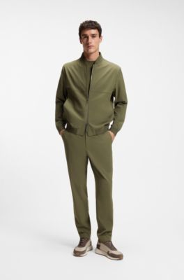 Pantaloni con fit affusolato in tessuto elasticizzato ad alte prestazioni, Verde