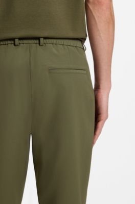Tapered-fit trousers in performance stretch fabric, Green