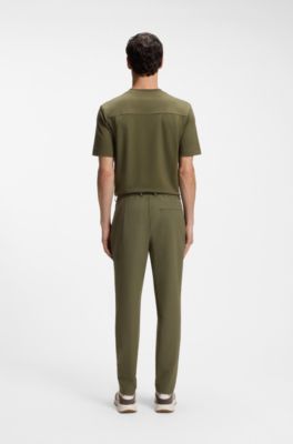 Tapered-fit trousers in performance stretch fabric, Green