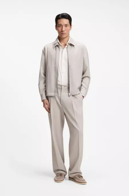 Chaqueta relaxed fit en lana virgen estampada con cremallera