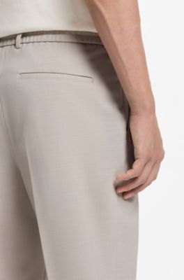 Pantaloni con fit affusolato in lana vergine con micromotivo, Beige chiaro
