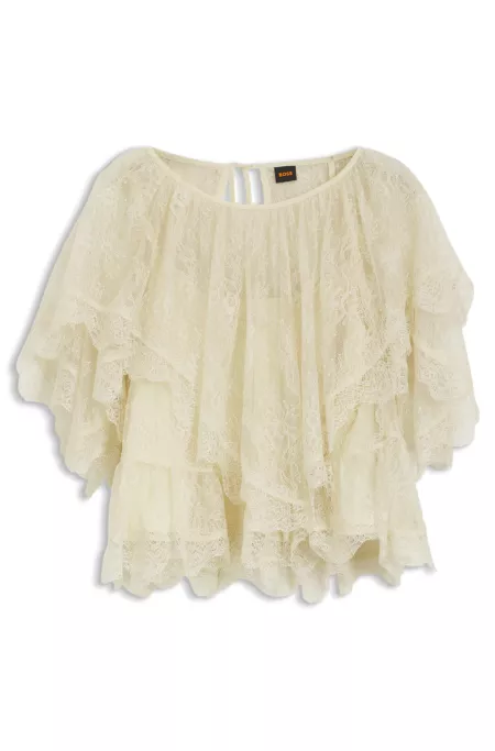 Mini cape blouse with lace trimmings