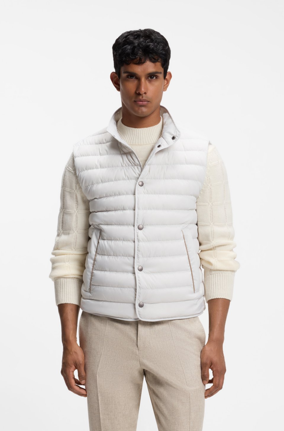 Water-repellent gilet with certified down filling