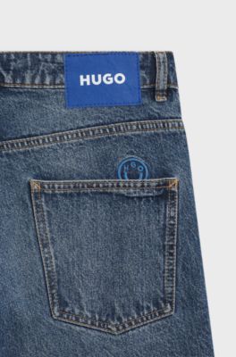 Jeans a gamba larga con vestibilit&agrave; comoda in cotone rigido, Blu