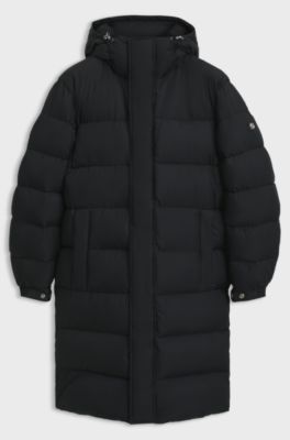 Long-length water-repellent puffer jacket with concealed closure, Black