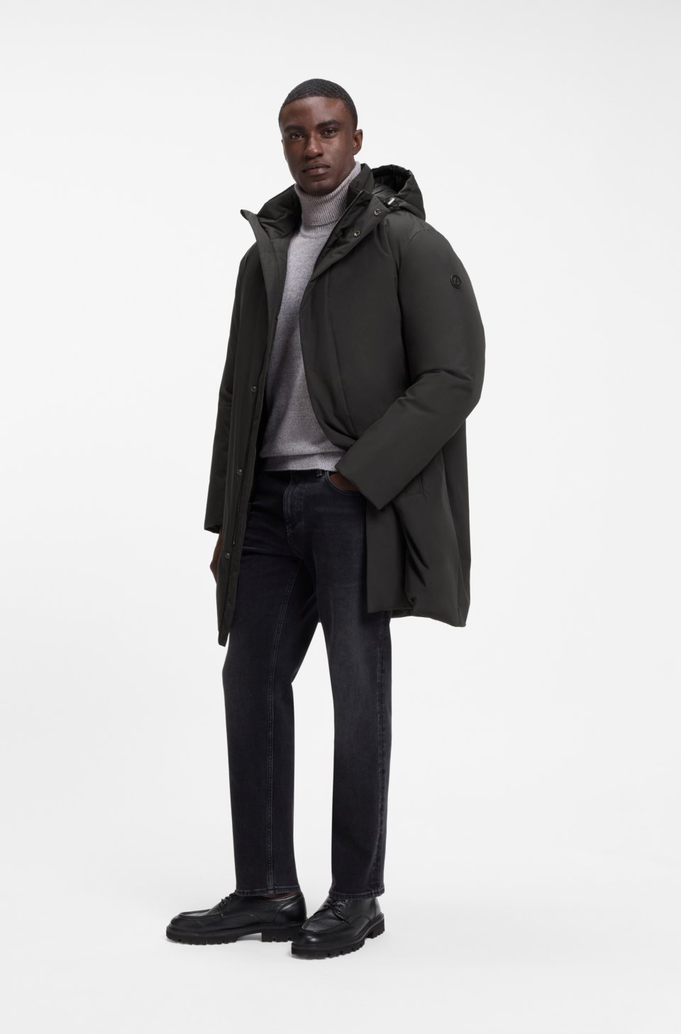 Hooded down jacket in water-repellent fabric
