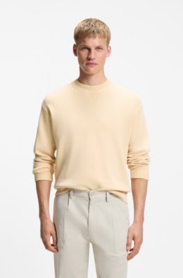 Cotton sweater with ribbed side seams
