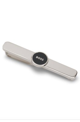 Brass tie clip with round logo detail