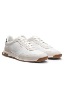 Mixed-material trainers with textured fabric, White