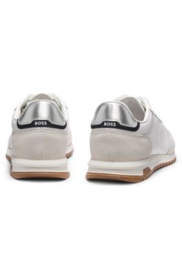 Mixed-material trainers with textured fabric, White