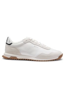 Mixed-material trainers with textured fabric, White