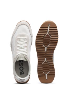 Mixed-material trainers with textured fabric, White