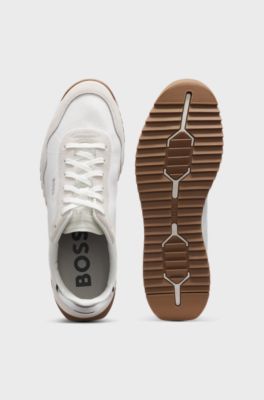 Mixed-material trainers with textured fabric, White