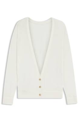 Knitted cardigan with rear button closure 1