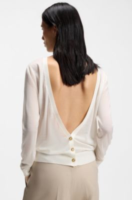 Knitted cardigan with rear button closure, White