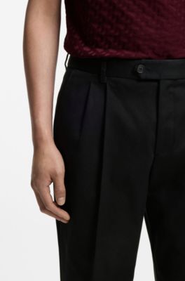 Pantaloni con fit affusolato in twill di cotone elasticizzato, Nero