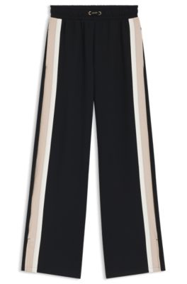 Tracksuit bottoms with contrast-stripe side seams, Black