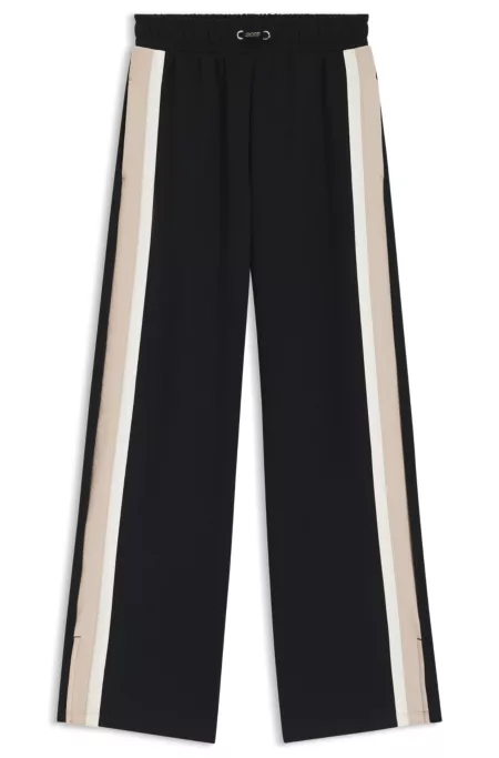 Pantalon de survêtement avec bandes contrastantes sur les coutures latérales
