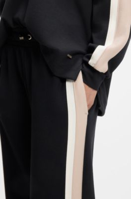 Pantalon de surv&ecirc;tement avec bandes contrastantes sur les coutures lat&eacute;rales, Noir